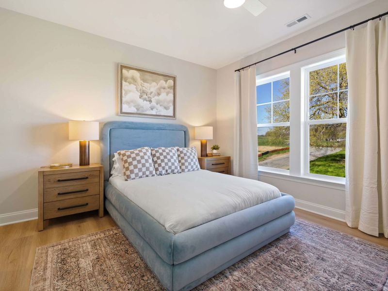Suite #5 - A daybed-style twin tucked under the window, a simple room that sleeps the overflow without fuss.