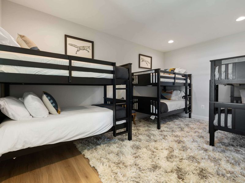 Bunk Room - A bunk room built for the kids (or kids at heart), with multiple bunks and plenty of floor space for playtime.