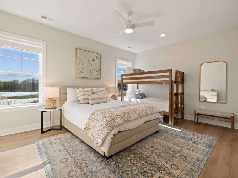 Suite #3 - A king bed paired with a bunk along the opposite wall, making this room a favorite for families or friends doubling up.