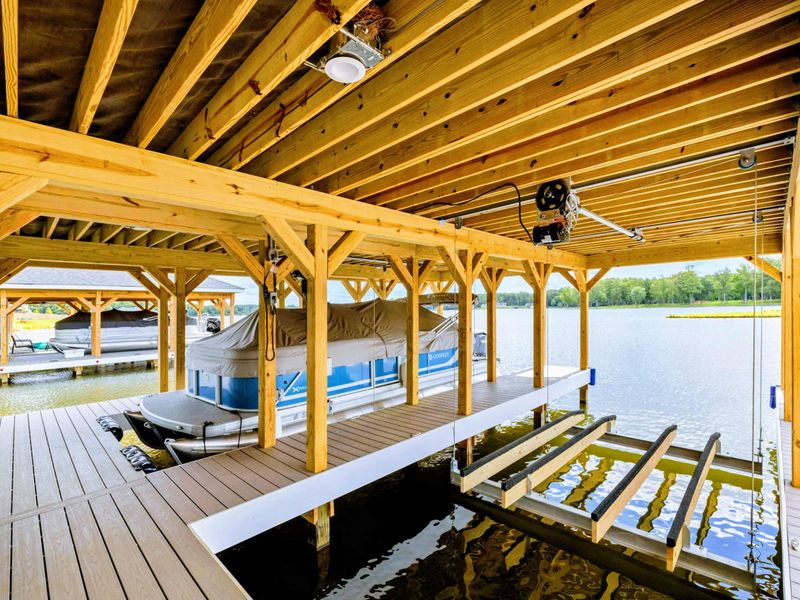 Backyard - Looking up into the boathouse timbers, a quiet corner of the dock for a moment out of the sun.