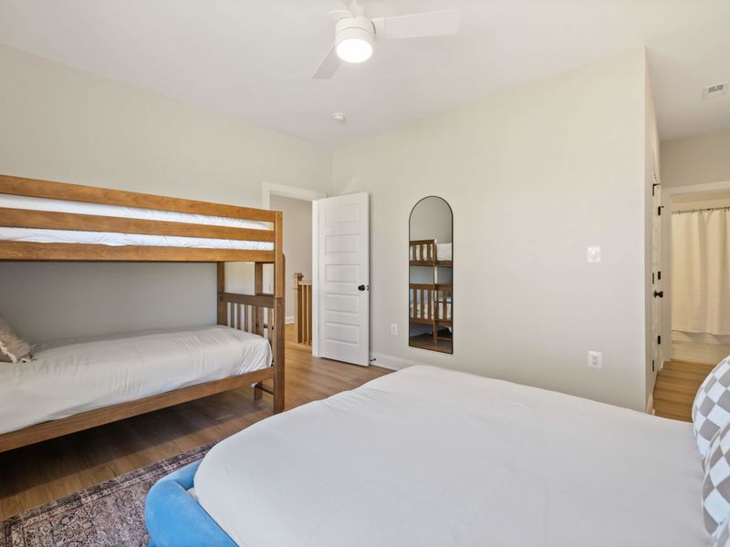 Suite #5 - Another angle of Suite #5, showing how the full bed and bunk share the room comfortably.