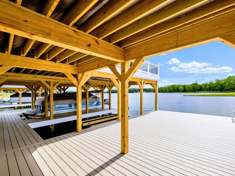 Backyard - Inside the covered dock, timber columns and open air make this the easy gathering spot between activities.