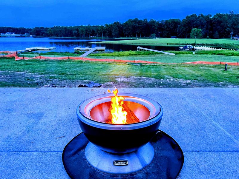 Patio - Gather around the blue fire pit for s'mores, cool evenings, and the low hum of conversation drifting off the water.