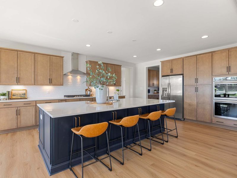 Kitchen - Cabinets, island, and plenty of counter space for the group to spread out breakfast or build dinner together.