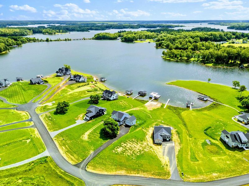 Backyard - Aerial pulling back to place the home in its exclusive private-side setting on Lake Anna.