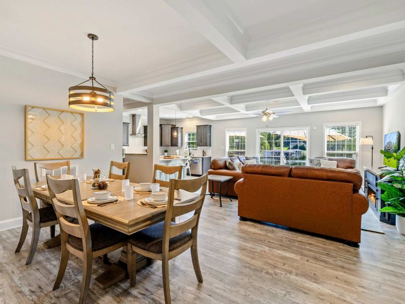 Open-concept dining and living area with a cozy, welcoming atmosphere, ideal for family gatherings