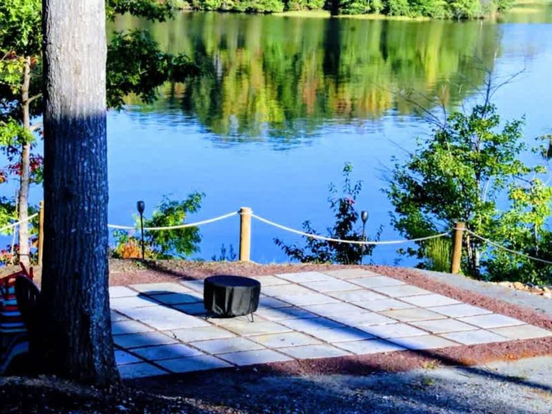Unwind on the brand-new patio with serene water views, featuring a smokeless fire pit ideal for roasting marshmallows and making s'mores under the stars.