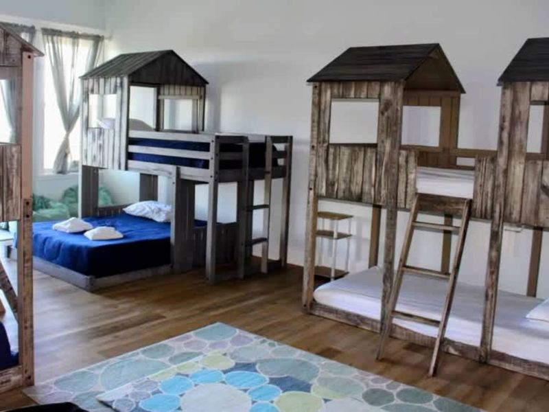 The fun and spacious bunk suite, now featuring 3 bunk beds, is perfect for accommodating larger groups and making sleepovers even more memorable.