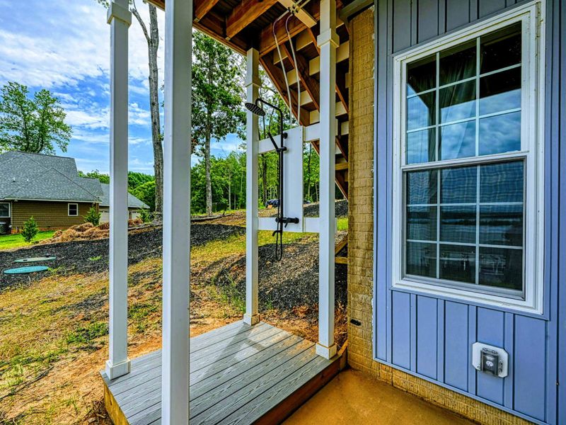 Convenient outdoor shower area, perfect for rinsing off after a day at the lake