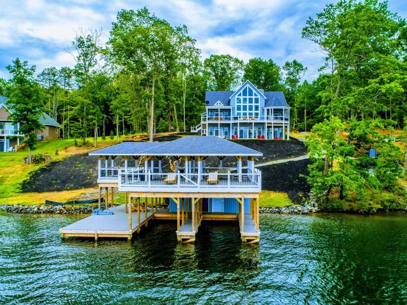 Stunning lakefront property with a spacious boathouse and beautiful views, perfect for a relaxing getaway