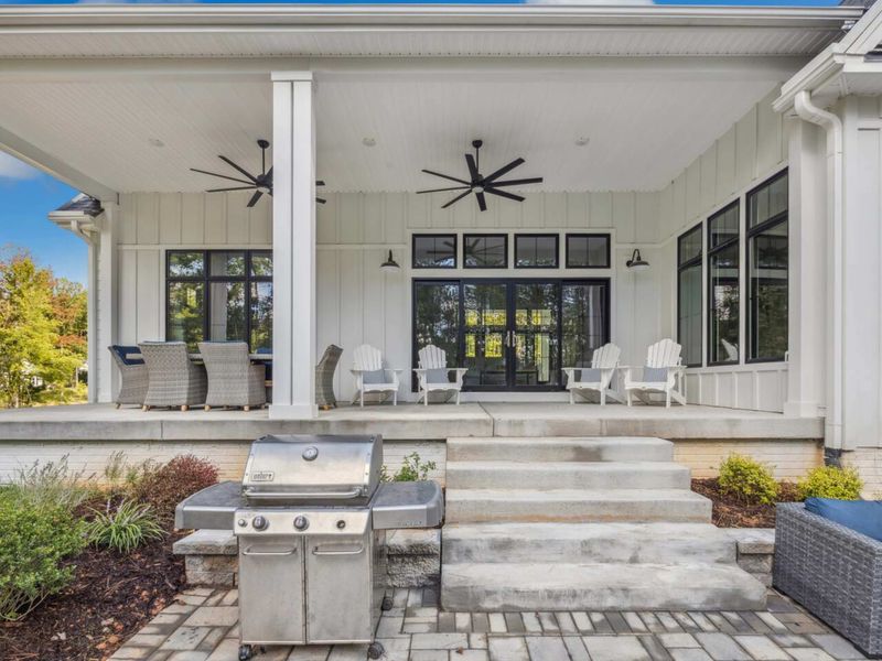 Fire up the grill and relax on our spacious covered patio, complete with comfortable seating and ceiling fans, perfect for outdoor dining and lounging.