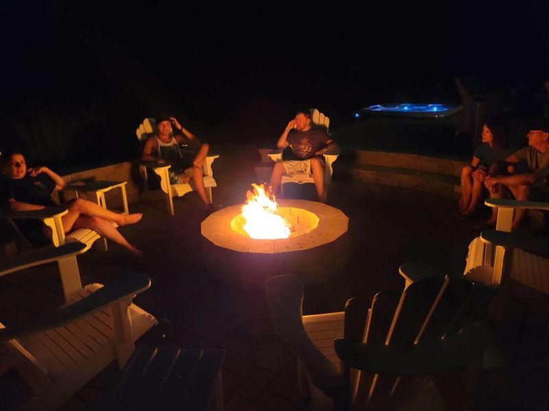 Gather around the glowing fire pit for an evening of laughter, storytelling, and s'mores, creating memories under the stars in the perfect outdoor setting.