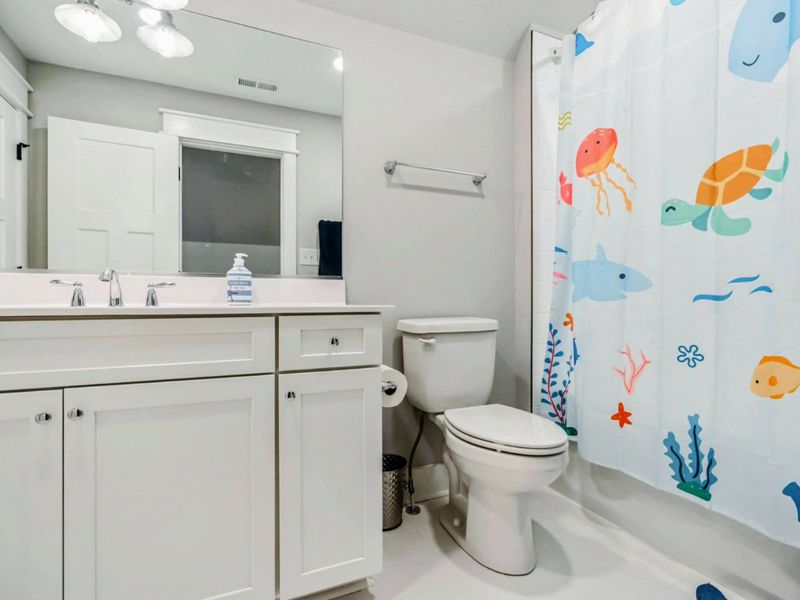 Bunk Room Suite Full Bathroom with Combination Shower and Tub.