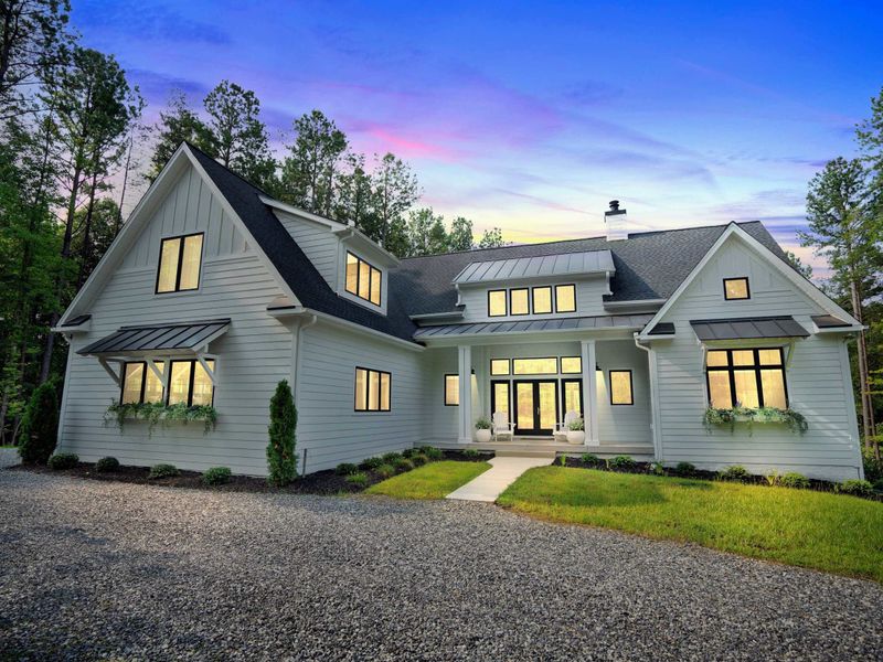Welcome to your luxurious getaway, a stunning brand new modern retreat nestled in nature, offering the perfect blend of elegance and comfort for your Lake Anna escape.