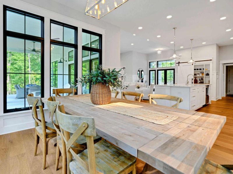 Dining area with large Restoration Hardware dining table!