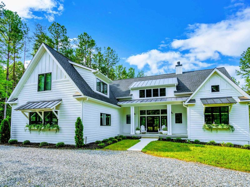 Welcome to your luxurious getaway, a stunning brand new modern retreat nestled in nature, offering the perfect blend of elegance and comfort for your Lake Anna escape.