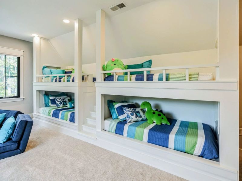 Upper level 4 bunk room suite with full bath and shower.