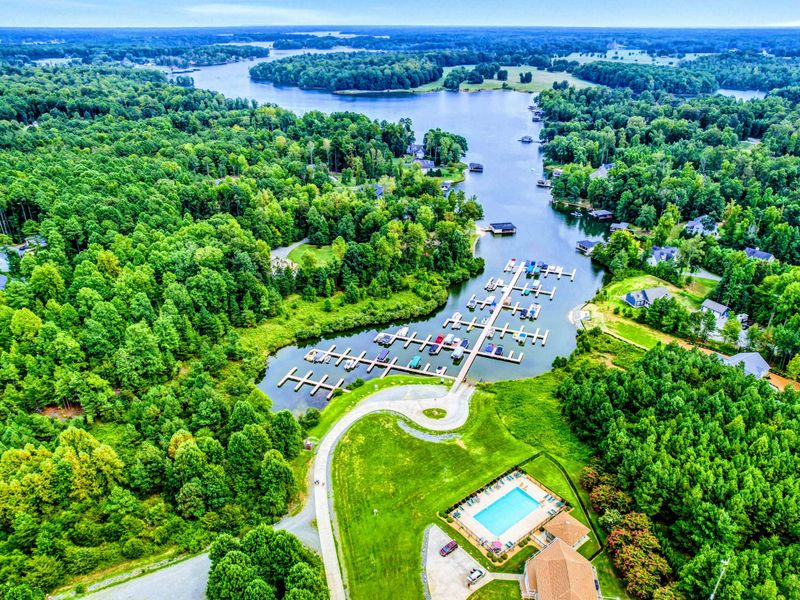 Main Common Area - A short drive away, the community marina, boat slips, and pool anchor The Waters' main gathering spot on the lake.
