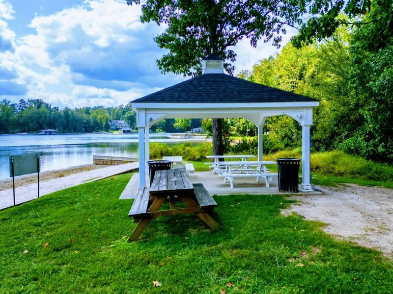 Community Beach Gazebo - A shaded gazebo and picnic tables sit right by the walkable beach, an easy basecamp for a full day in the sand.