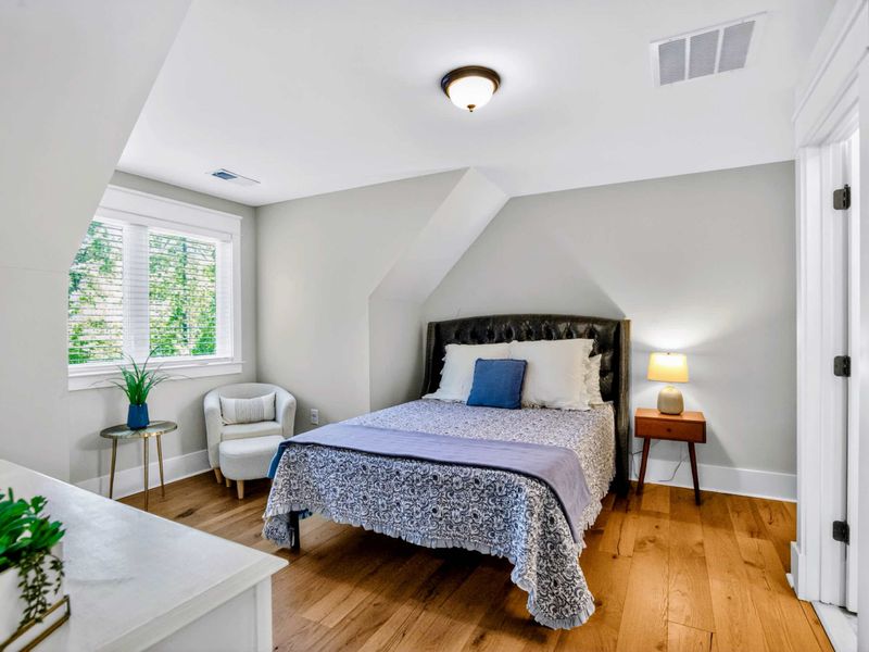 Suite 4 - Vaulted dormer ceiling and a quiet reading nook make this upstairs retreat feel tucked away.