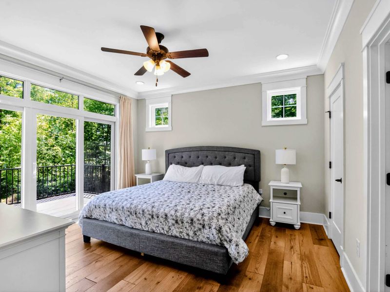 Suite 1 - King bed framed by glass, step straight onto your private balcony with the lake breeze for company.