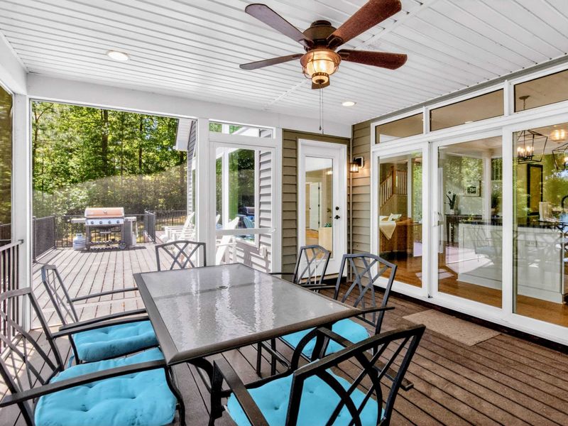 Screened Porch - Eight at the table, grill steps away, bugs locked out, evenings out here run long.