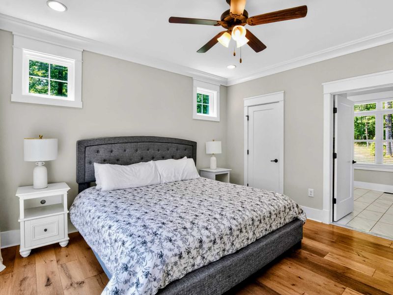 Suite 1 - Upholstered king bed with the en-suite bath right through the door, a private little wing of its own.