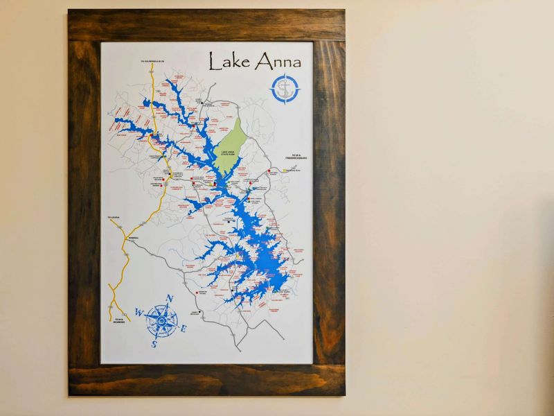 Decor Detail - Framed Lake Anna map in a rustic wood frame, perfect for planning your lake adventures.