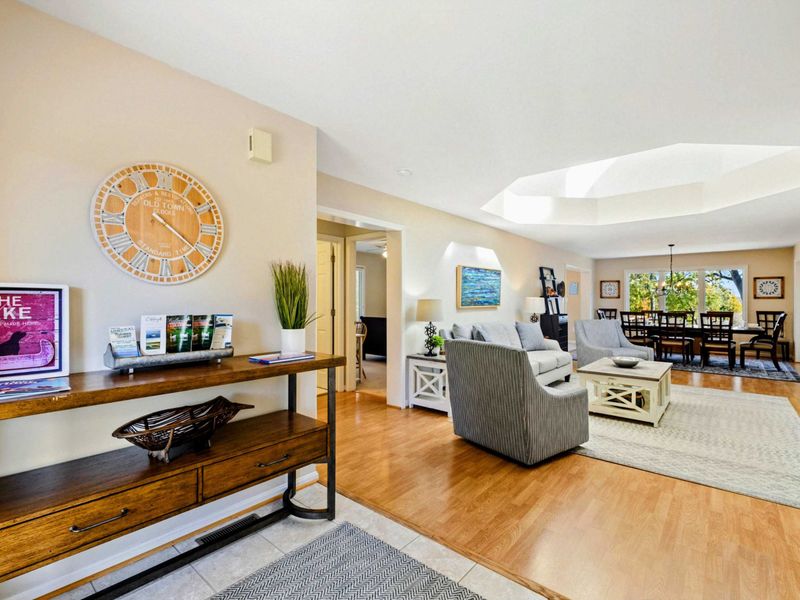 Inviting open-concept living and dining area with stylish furnishings and a cozy atmosphere