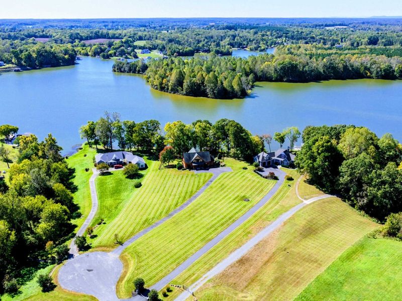 Escape to this picturesque lakeside community with sprawling green lawns, peaceful waterfront views, and a tranquil, secluded atmosphere.