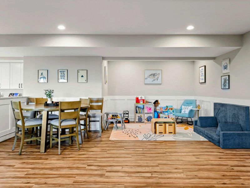 Lower Living Area - Elevated perspective of the open lower level layout.