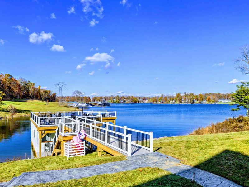 Dock - Property view from the water showing the dock and waterfront.