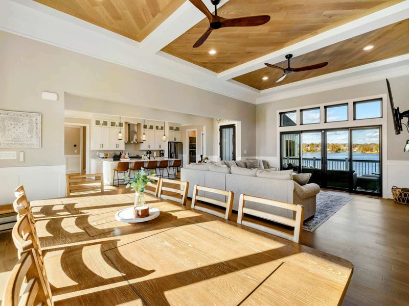 Great Room - Wider view of the open-plan main level with kitchen visible beyond.