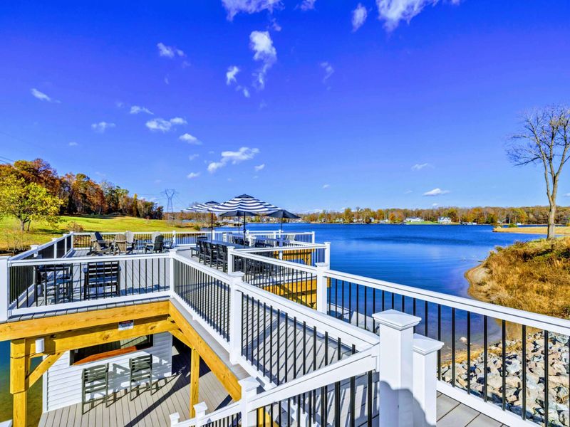 Dock - Covered dock seating area with ceiling fans overlooking the cove.