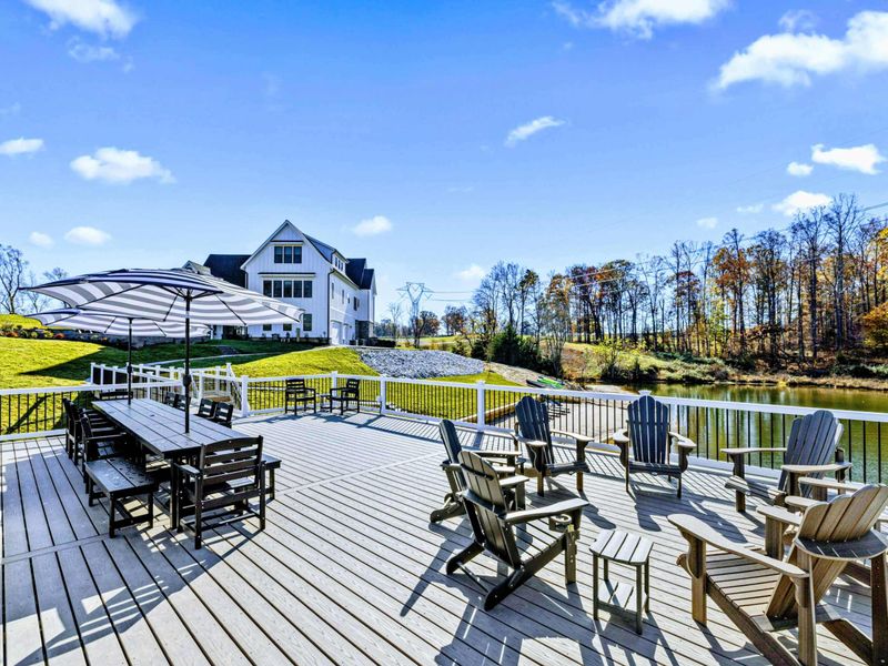 Dock - Lower dock level with lounge chairs and ladder access to the water.