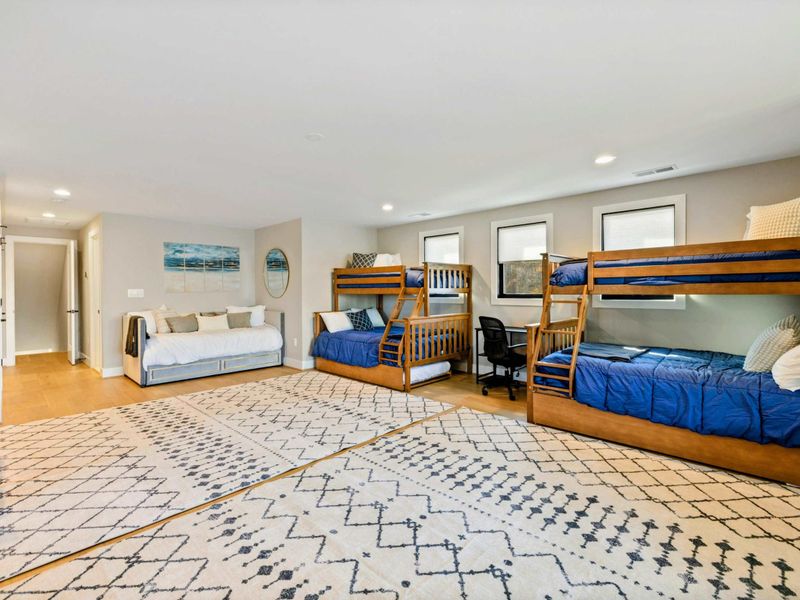 Bunk Room (Large) - Daybed and storage area along the wall.