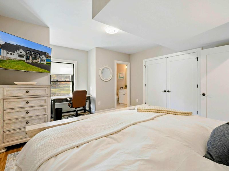 Bedroom 2 - Wider angle capturing the full room with natural light.