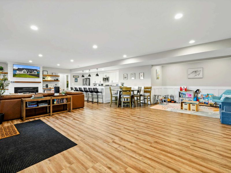Lower Living Area - View from the kitchenette toward the fireplace and seating area.