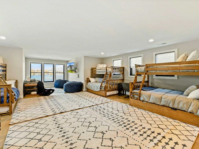 Bunk Room (Large) - View from the far end showing all eight bunks.