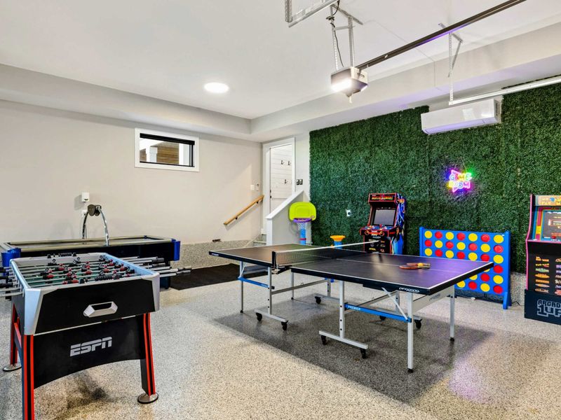 Game Room - Full room view showing the variety of game stations.
