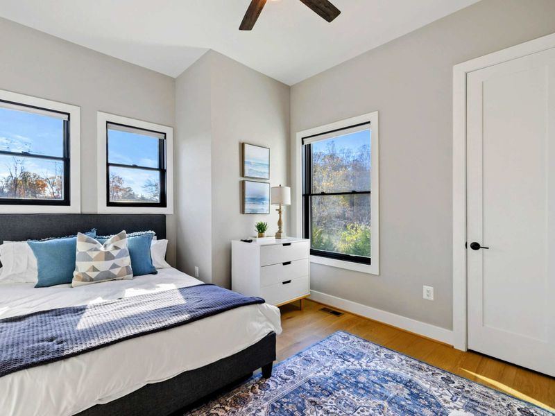 Bedroom 4 - Alternate angle showing the full room and natural light.