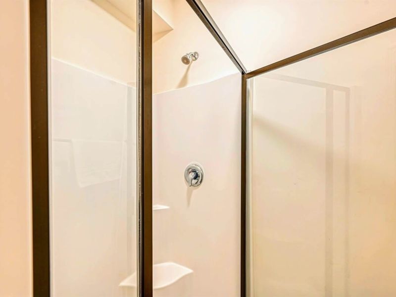 Jack & Jill Bath - Modern fixtures, plenty of counter space, built for two rooms to share comfortably.