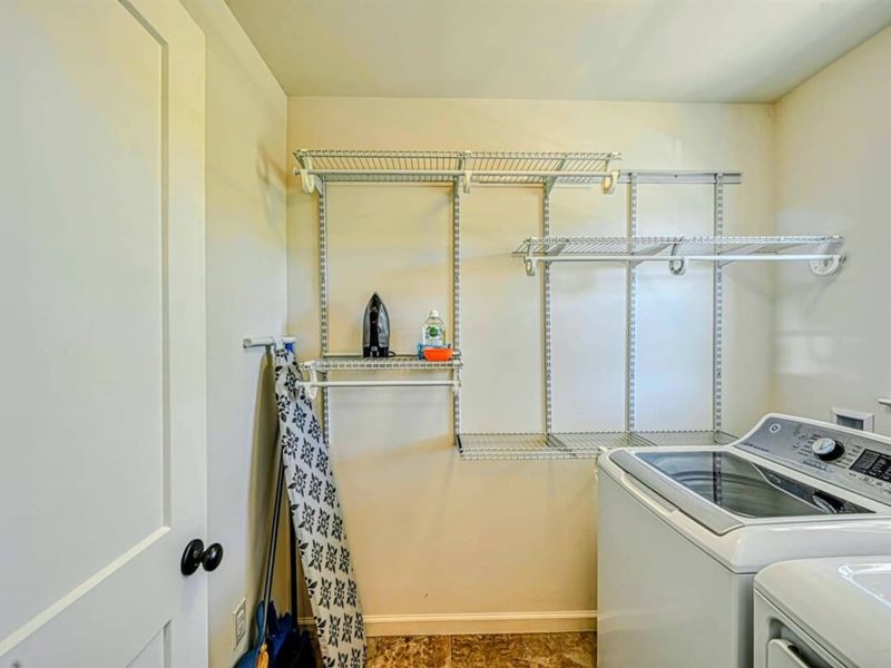 Laundry Room - Bright, organized, ready for a sixteen-guest weekend.