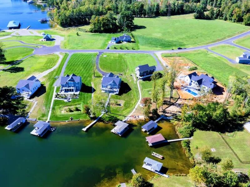 Aerial View - The scale of the lakefront and the depth of the private lot.