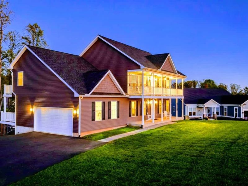 Lakefront Home - Three levels of deck, full lake exposure, the kind of evening light Lake Anna is known for.