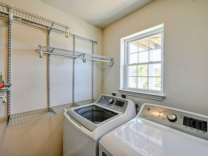 Laundry Room - Full-size washer and dryer, plus shelving for the wet swimsuits at the end of every day.