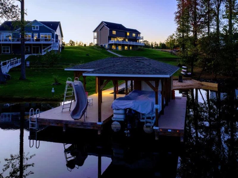 Dock at Night - Lit dock, calm water, the kind of stillness that keeps you outside longer than you planned.