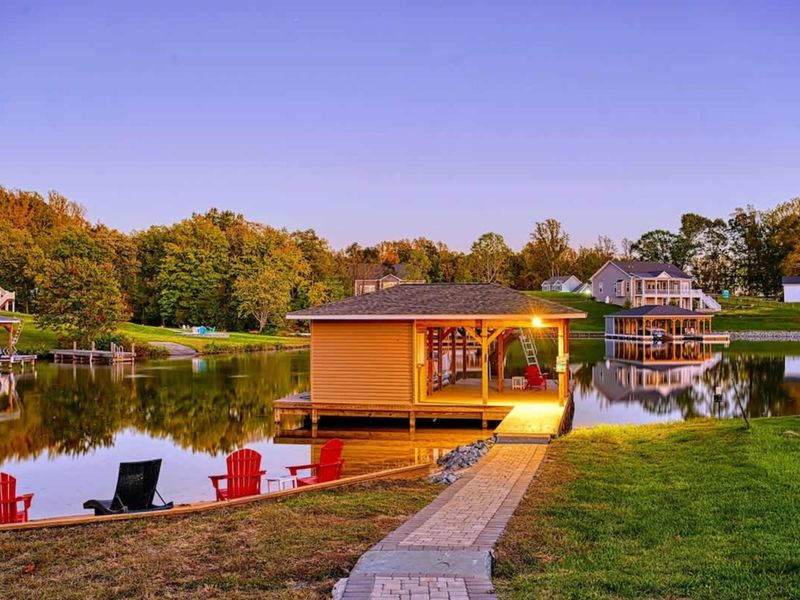 Dock at Sunset - Adirondack chairs facing the water, the morning coffee spot, the after-dinner walk.