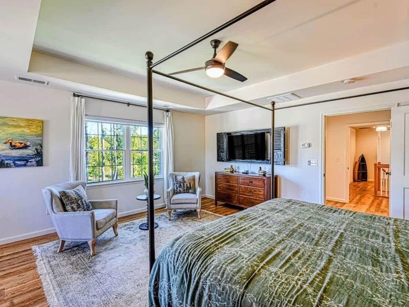 Primary Suite - Designed to feel like the calm corner of a busy lake weekend.