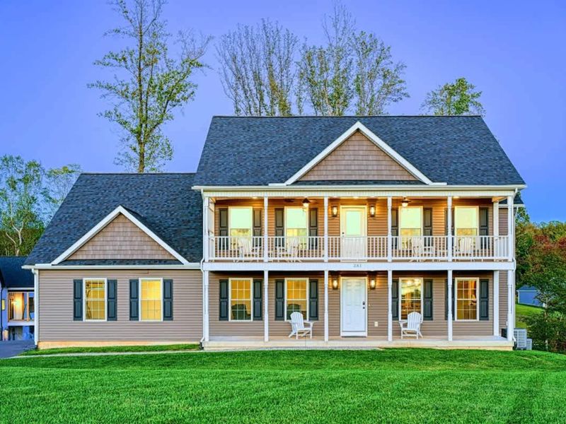 Driveway - Six parking spaces, EV charger in the garage, room for everyone's car.